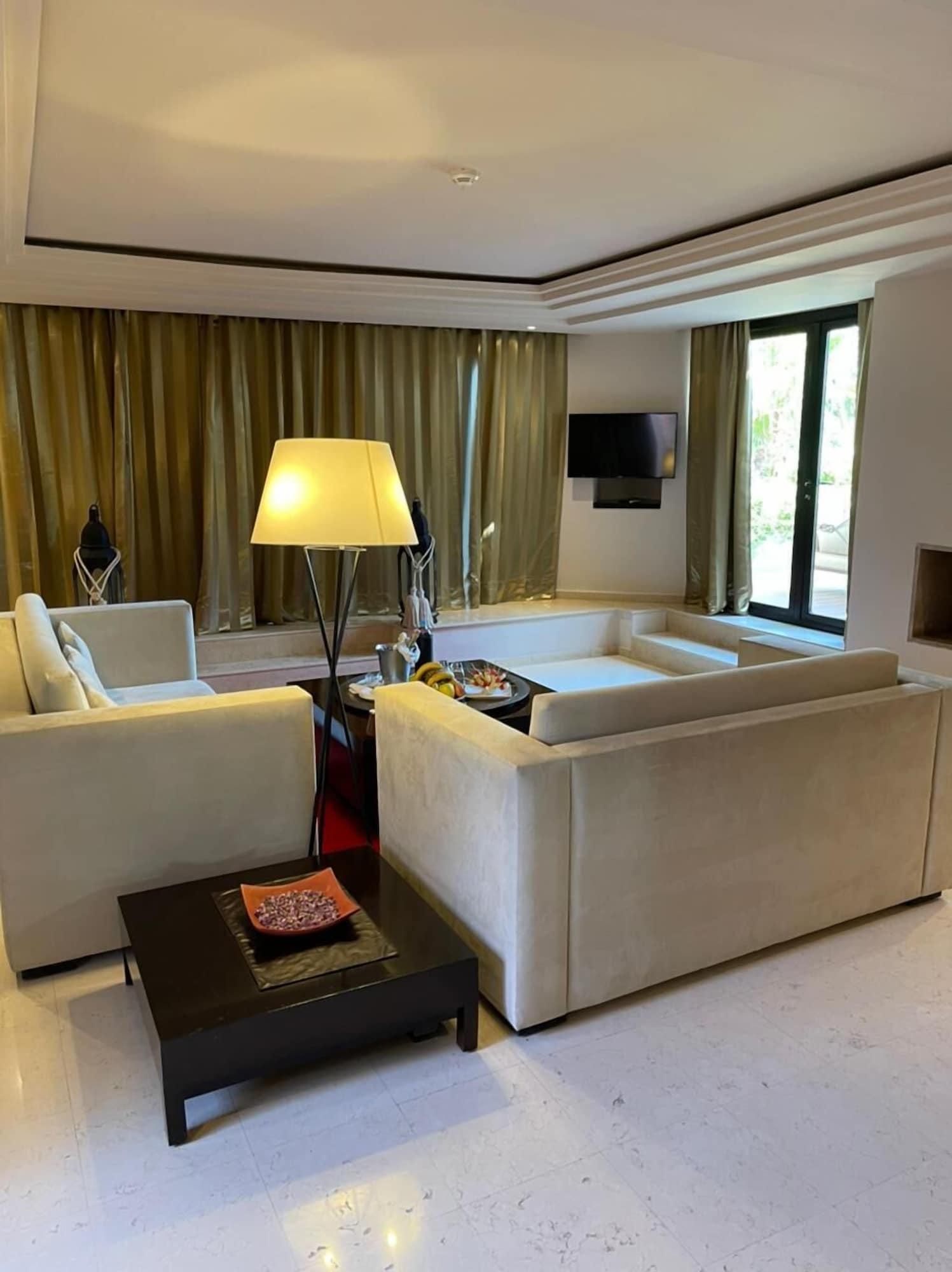 Les Jardins De La Koutoubia Hotel Marrakesh Luaran gambar A living room at the Taj Bengal